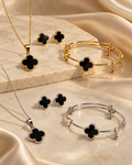 Zaria black clover jewellery set in Gold and Silver with necklace earrings and bracelet
