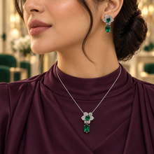Model wearing the Liora Emerald Green floral necklace and matching drop earring