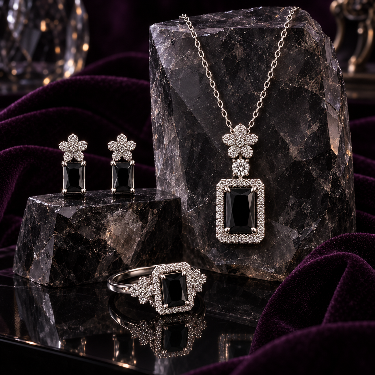 Black Fiora Bloom jewellery set with pendant necklace, earrings and ring