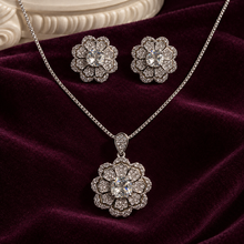 Clear Celestia Rosette pendant necklace with matching floral stud earrings