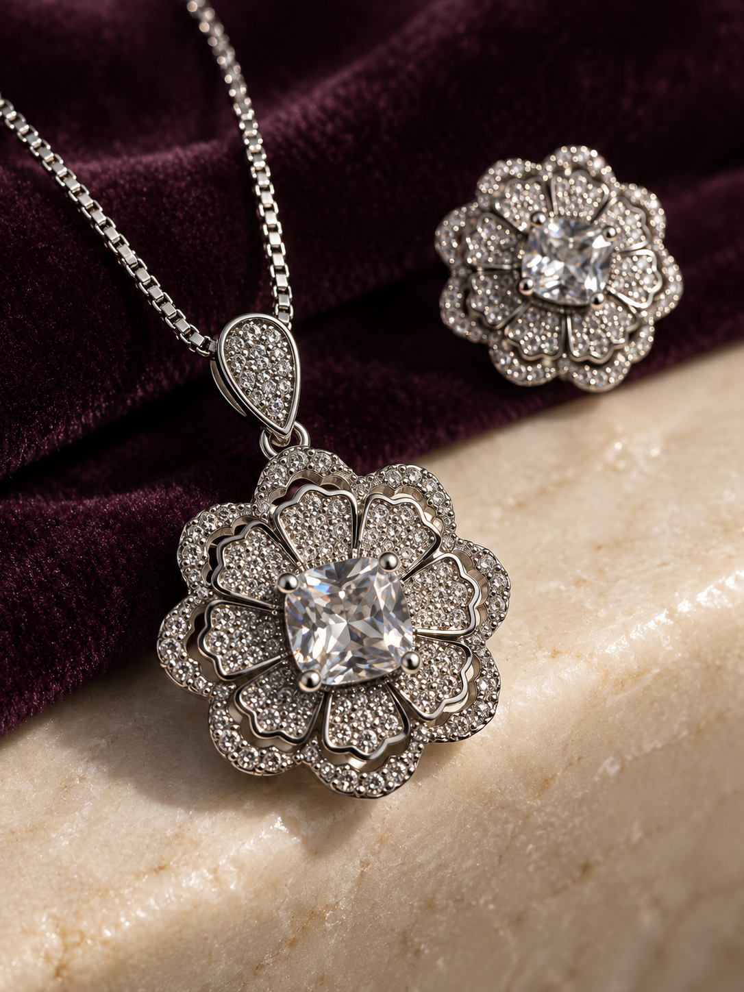 Close-up of the Celestia Rosette pendant’s square centre stone and layered petals