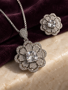 Close-up of the Celestia Rosette pendant’s square centre stone and layered petals