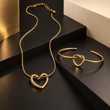 Gold Nova Loop Heart pendant necklace with matching open-cuff bracelet