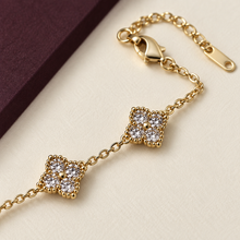 Close view of the Liora Clear crystal clover motifs, clasp and extender chain