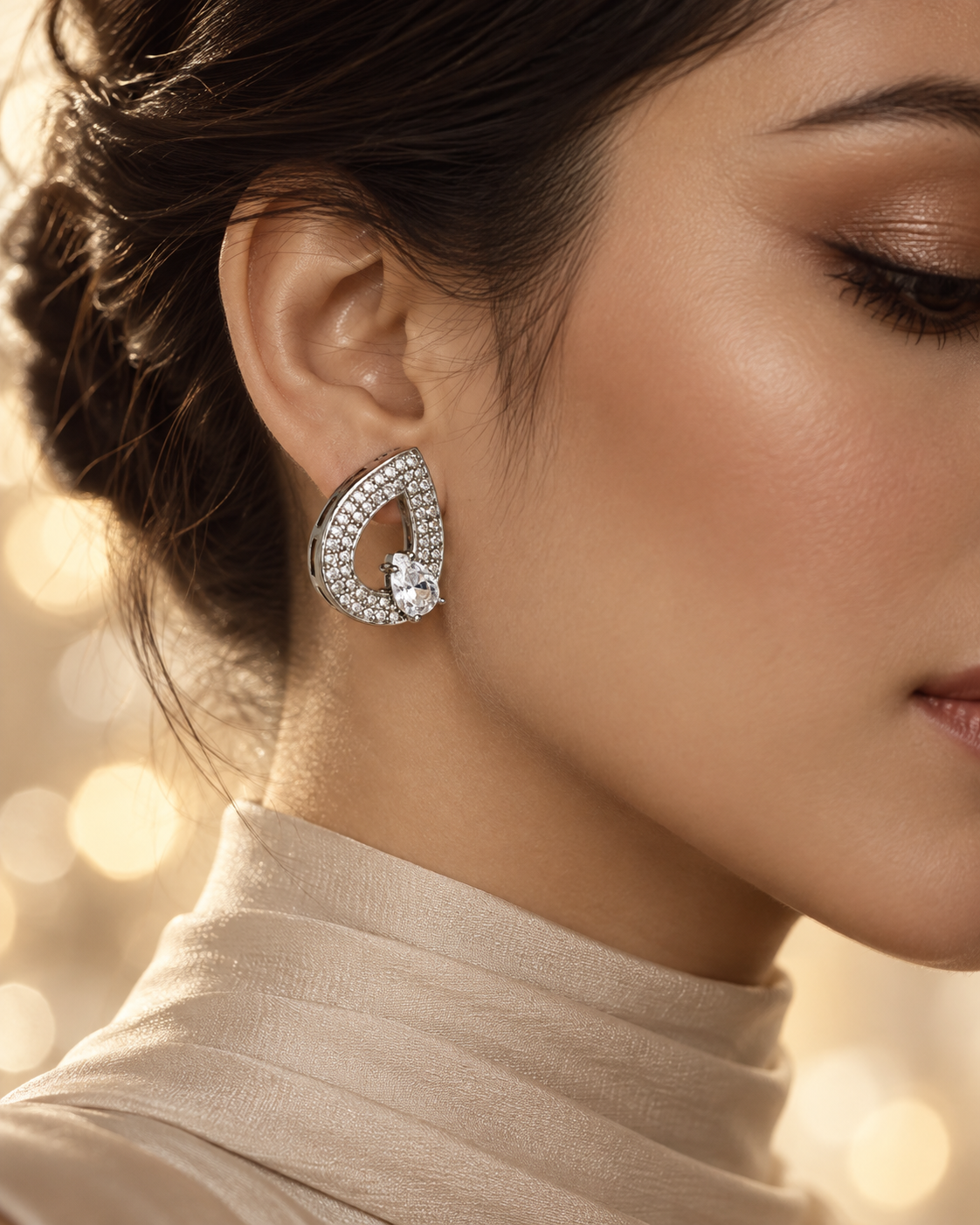 Crystal White Selene S925 silver teardrop stud earring shown in a close-up side profile