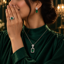 Green Fiora Bloom jewellery set showing matching earrings, pendant and ring